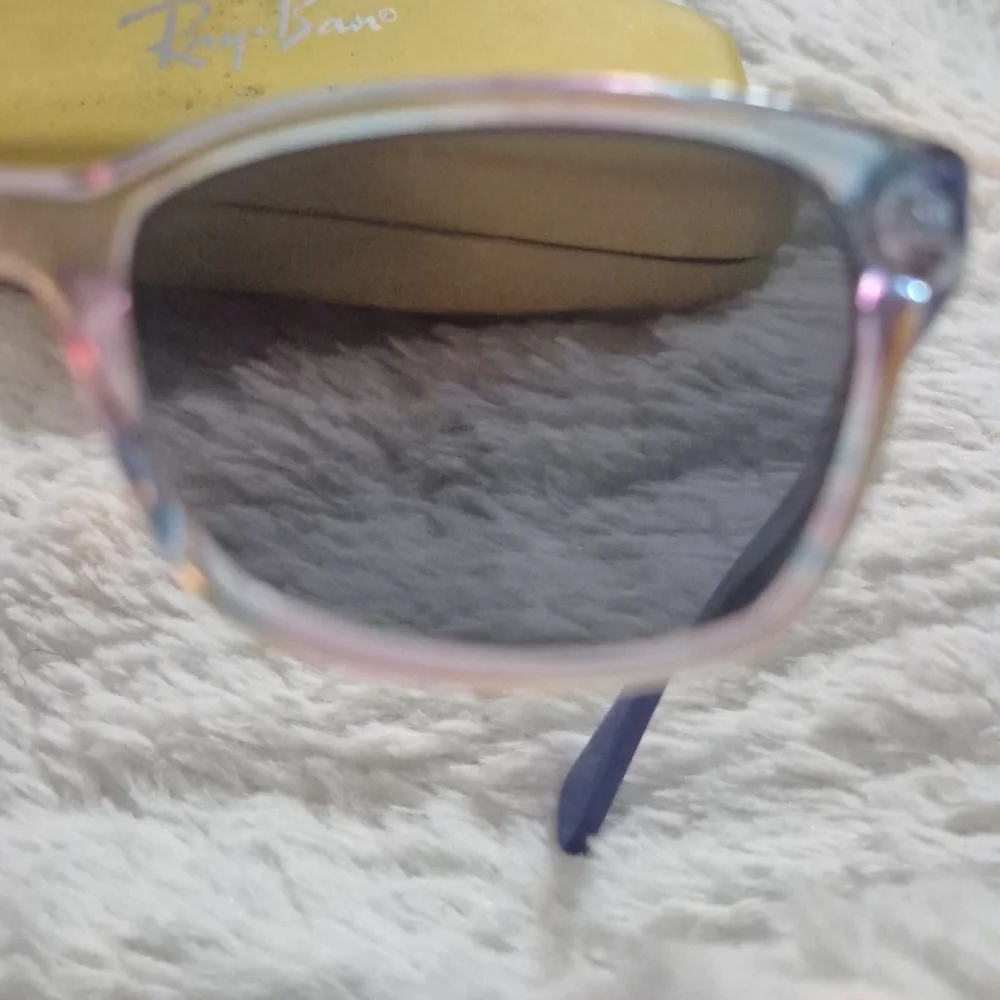 Ray-Ban Transparent Blue Sunglasses with Vibrant Case